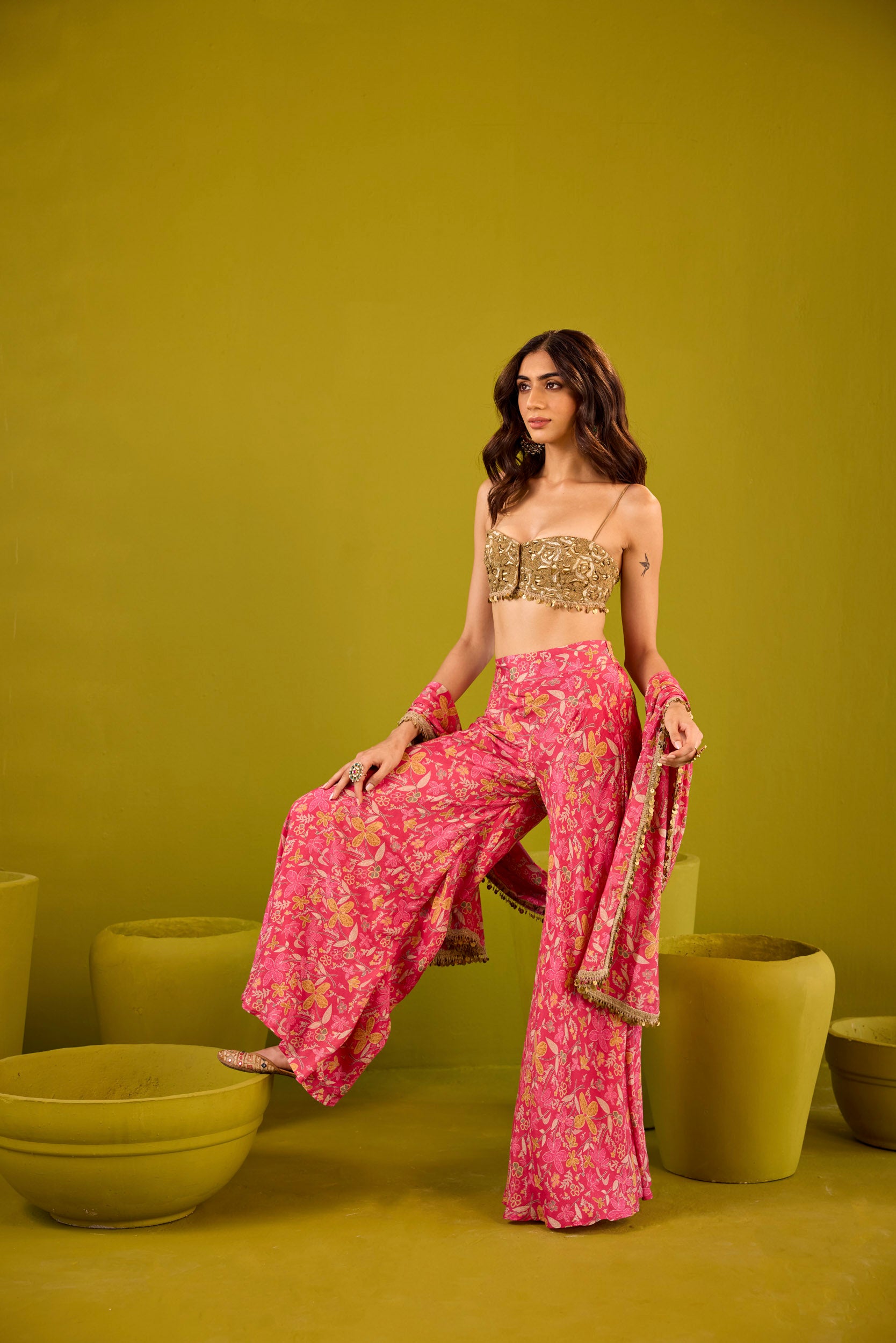 Mannat Hot Pink Muslin Sharara Set With Gold Embroidered Blouse