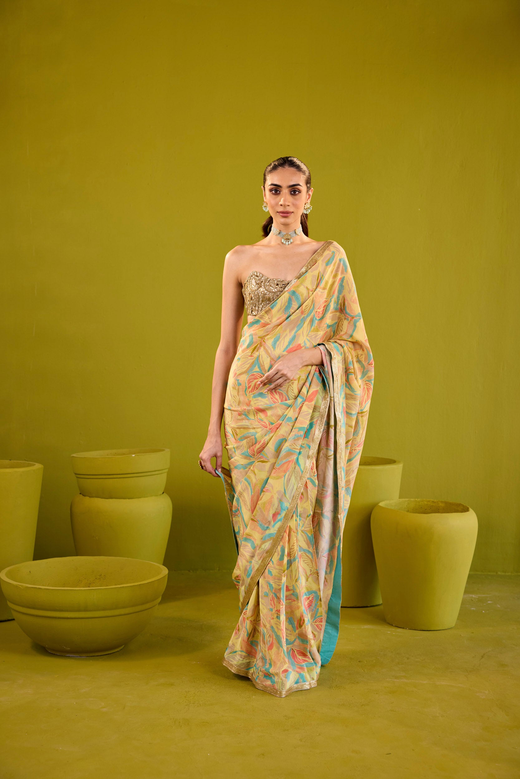 Kashish Yellow Crepe Saree With Gold Embroidered Strapless Blouse