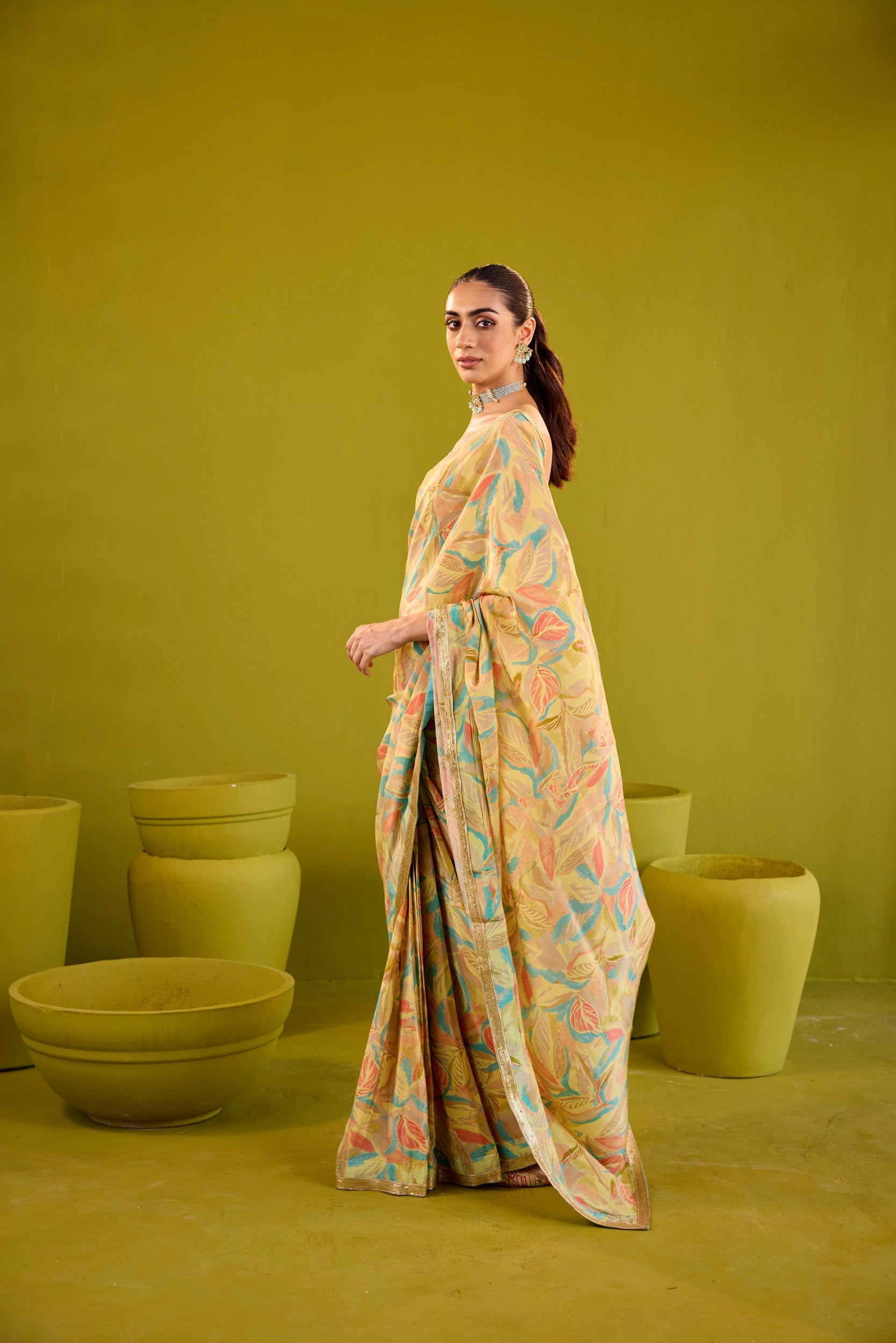 Kashish Yellow Crepe Saree With Gold Embroidered Strapless Blouse