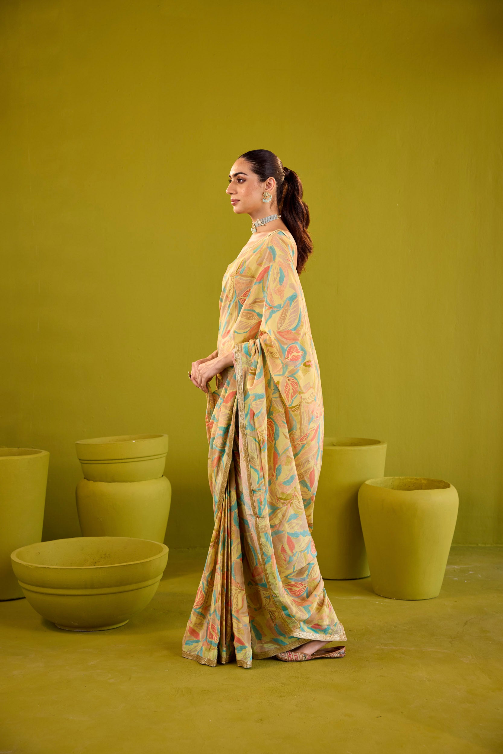 Kashish Yellow Crepe Saree With Gold Embroidered Strapless Blouse