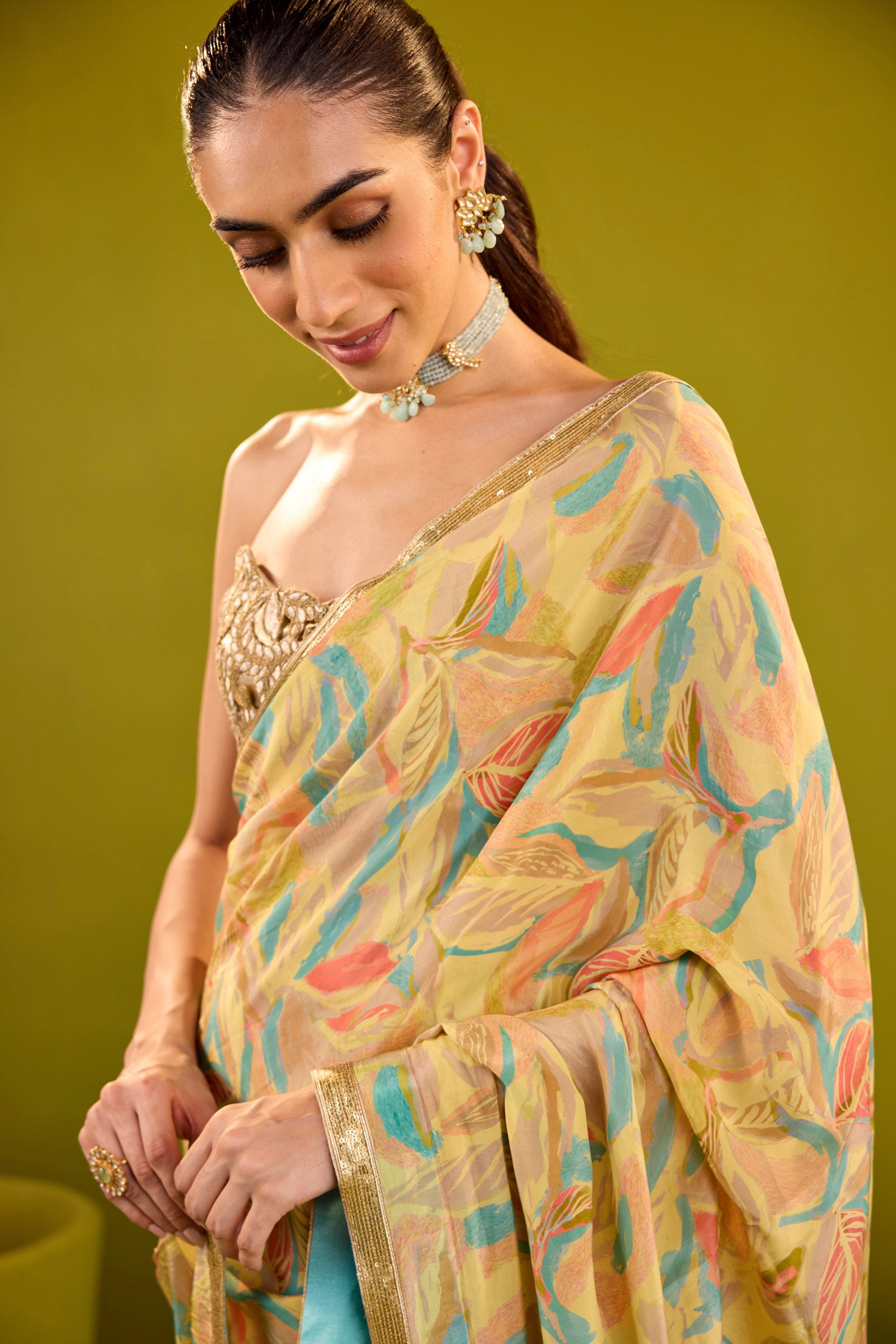 Kashish Yellow Crepe Saree With Gold Embroidered Strapless Blouse