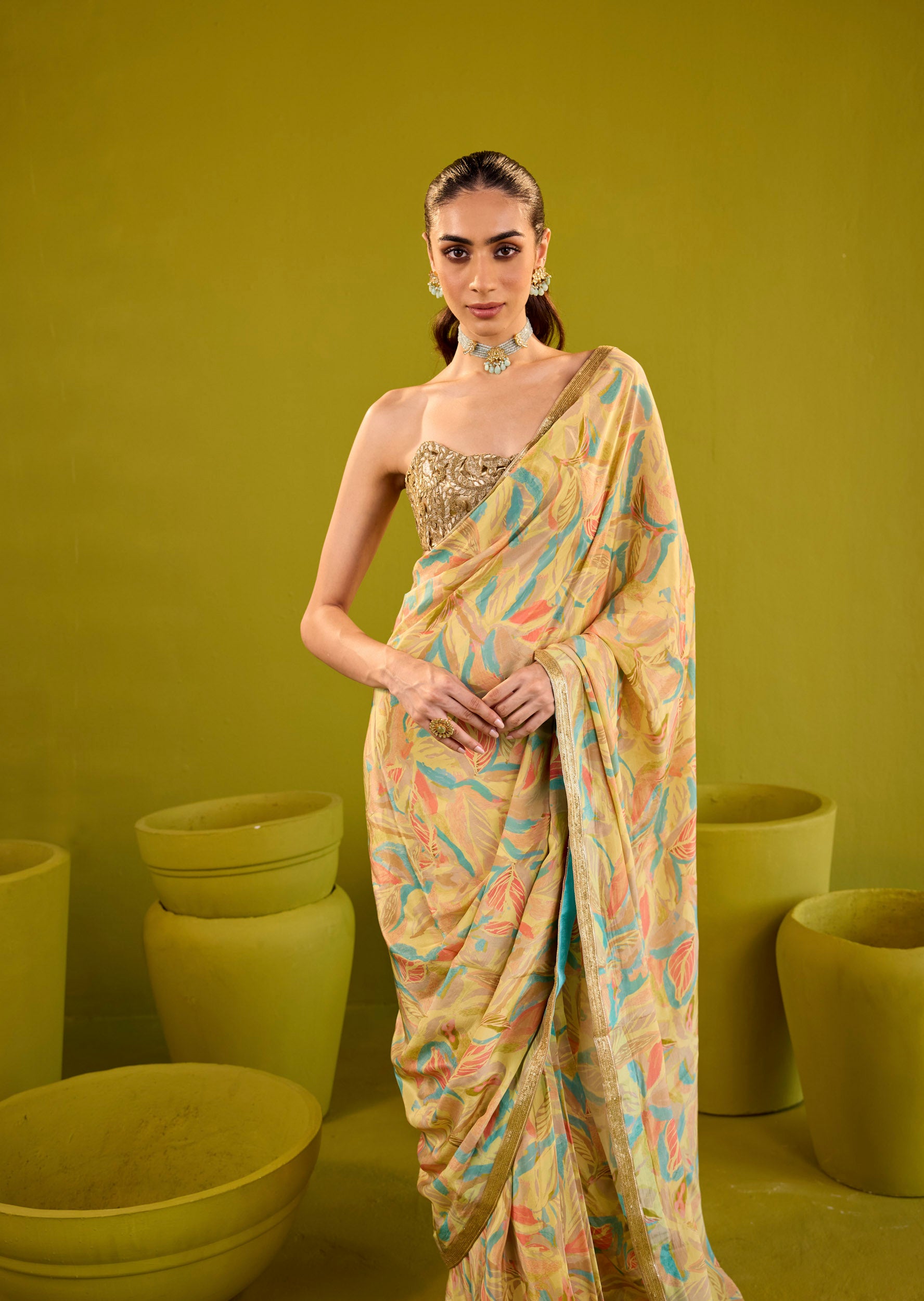 Kashish Yellow Crepe Saree With Gold Embroidered Strapless Blouse