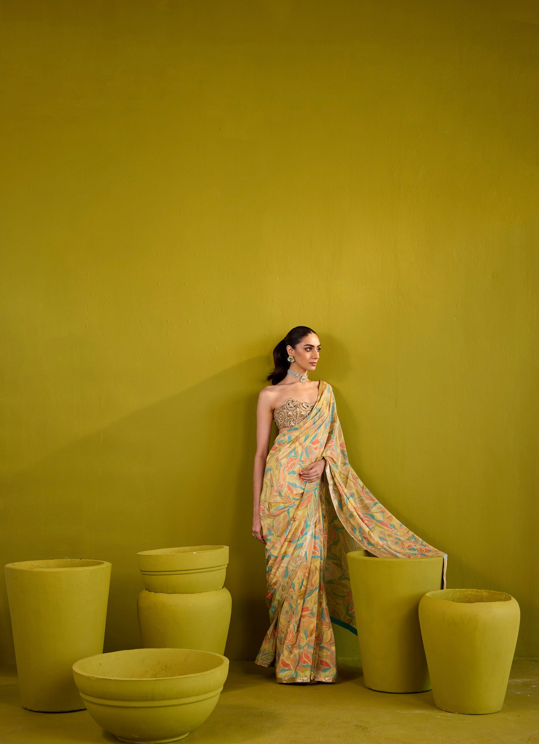 Kashish Yellow Crepe Saree With Gold Embroidered Strapless Blouse