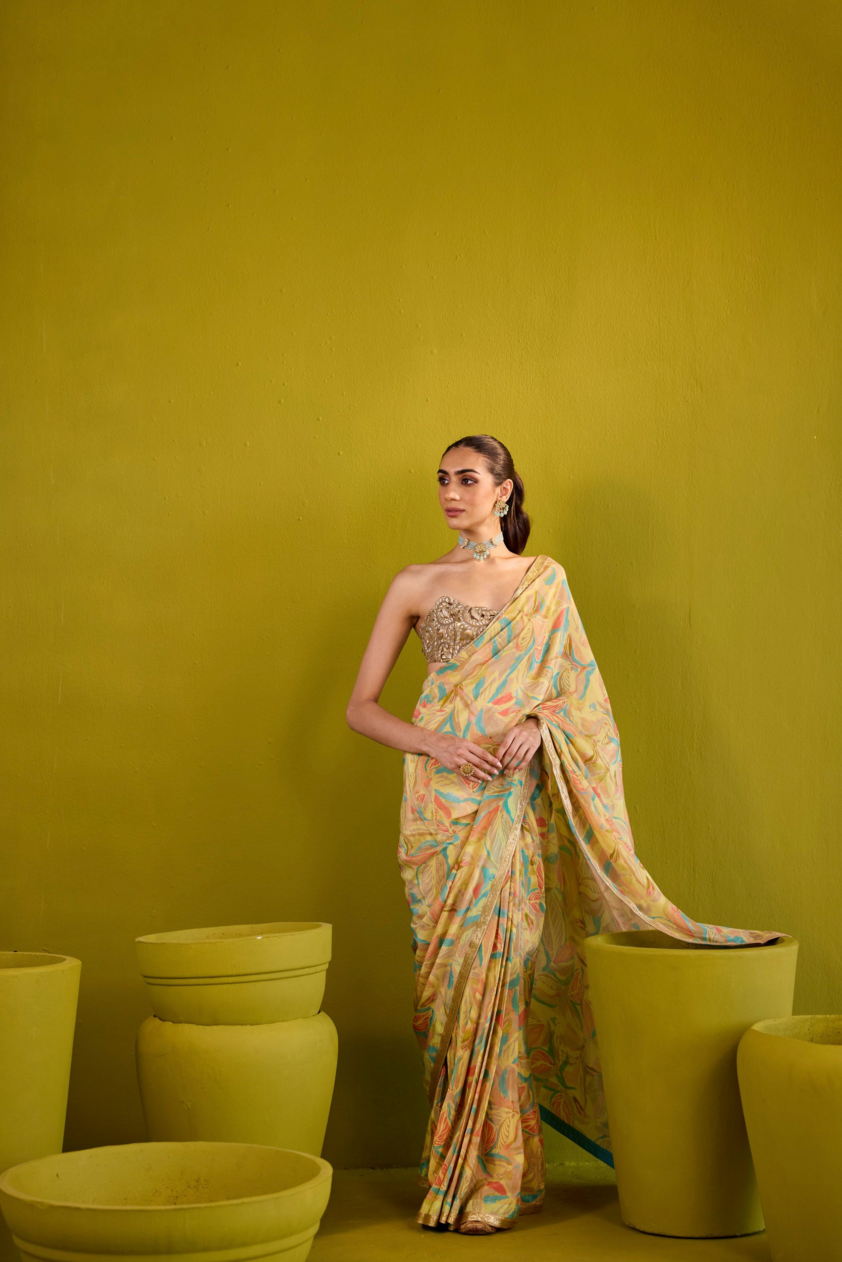 Kashish Yellow Crepe Saree With Gold Embroidered Strapless Blouse