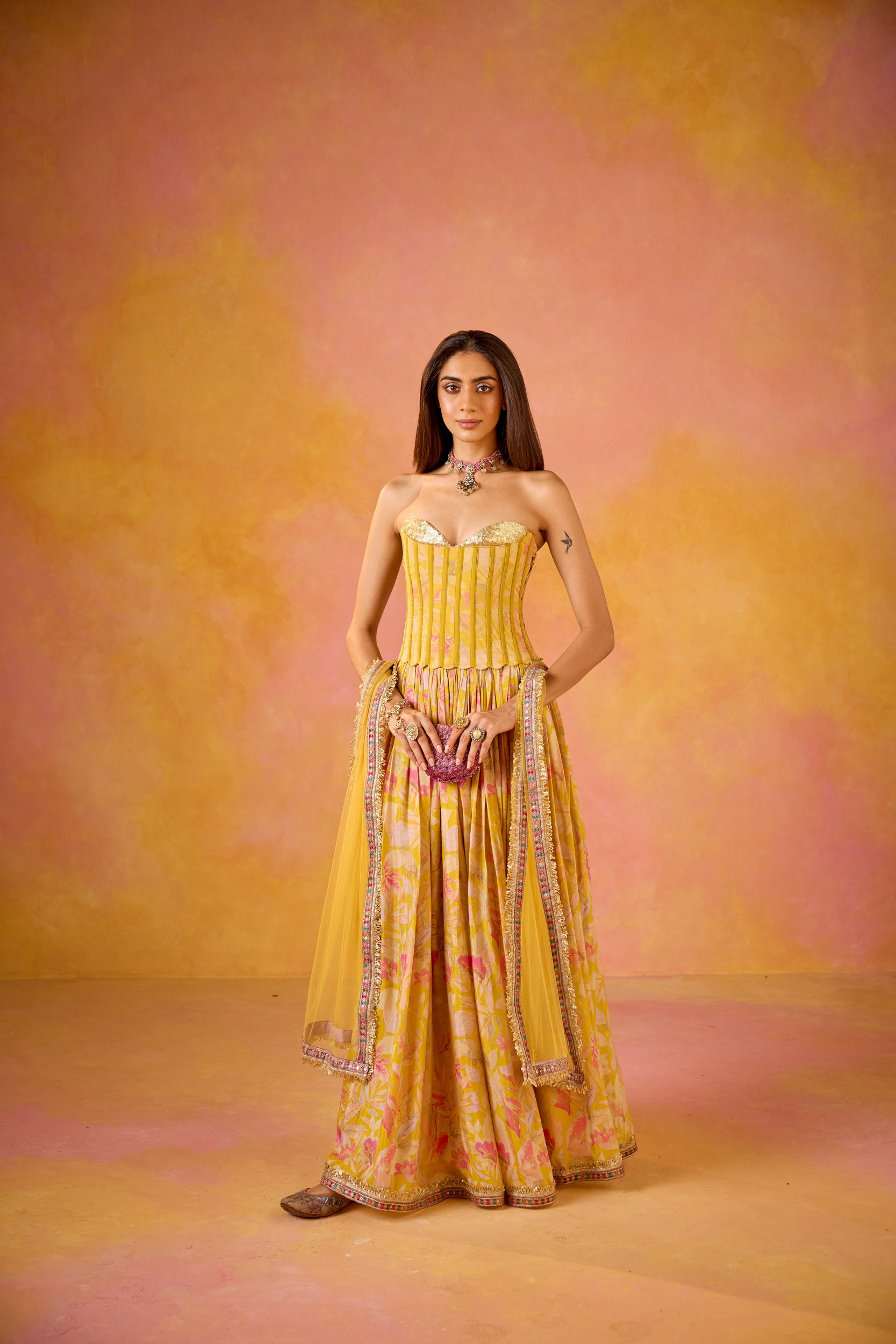Anaya Yellow Sequinned Corset Muslin Lehenga Set