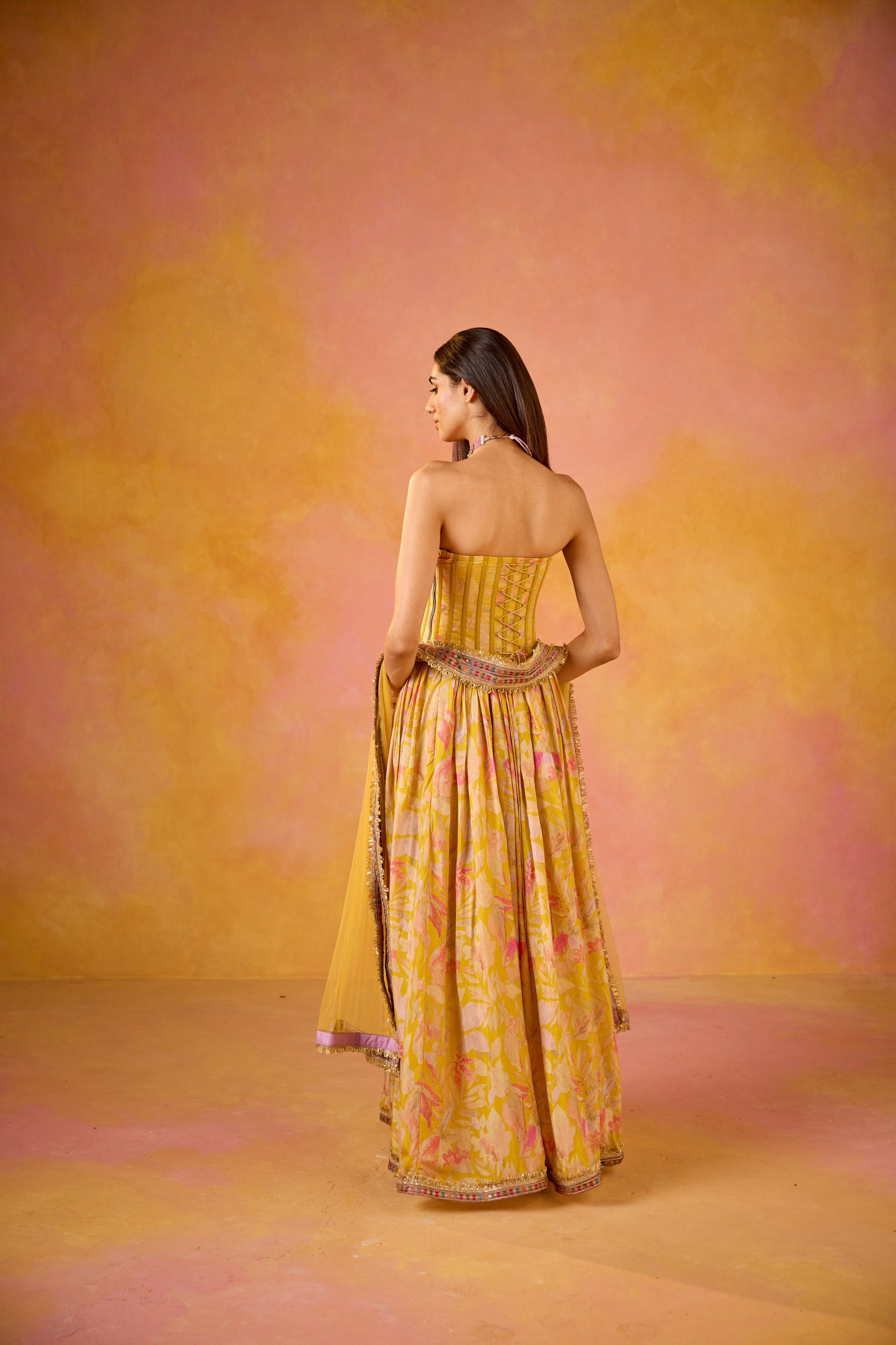 Anaya Yellow Sequinned Corset Muslin Lehenga Set