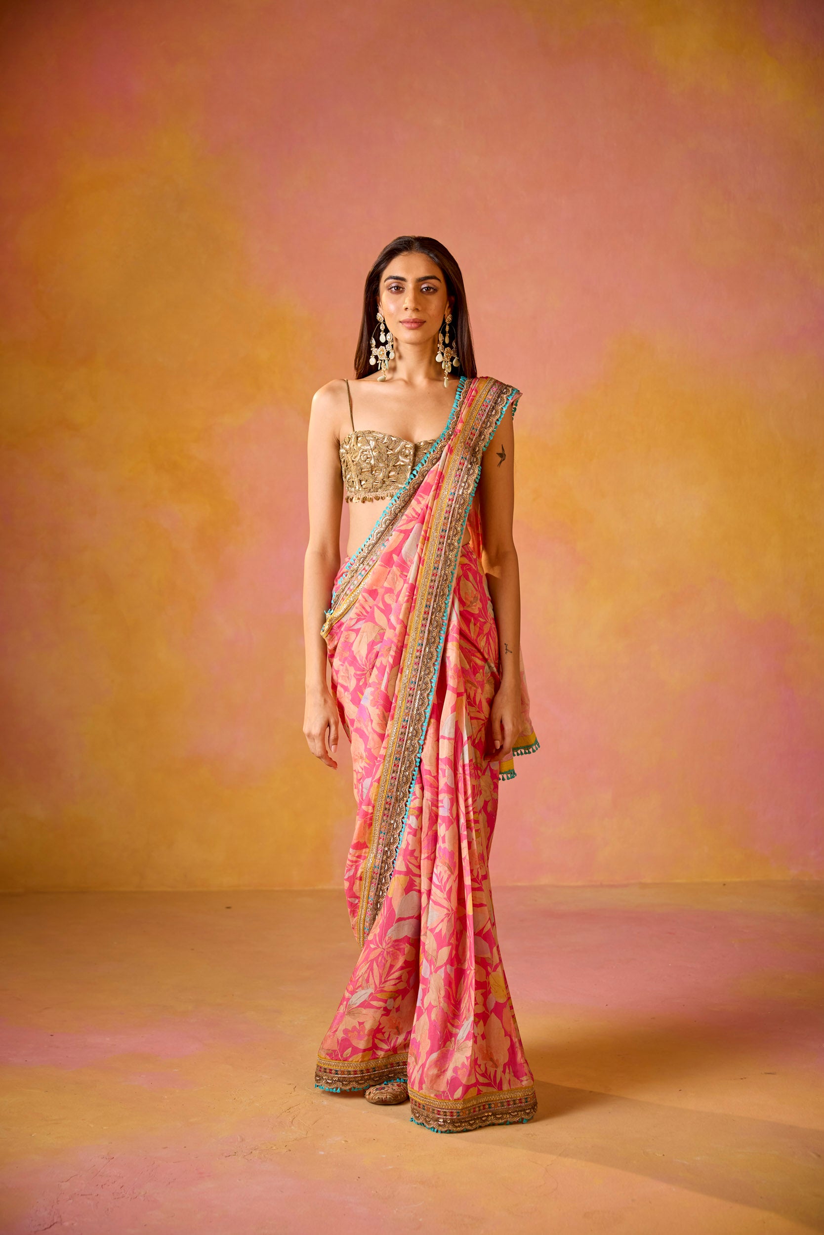 Aarohi Pink Muslin Saree With Gold Embroidered Blouse