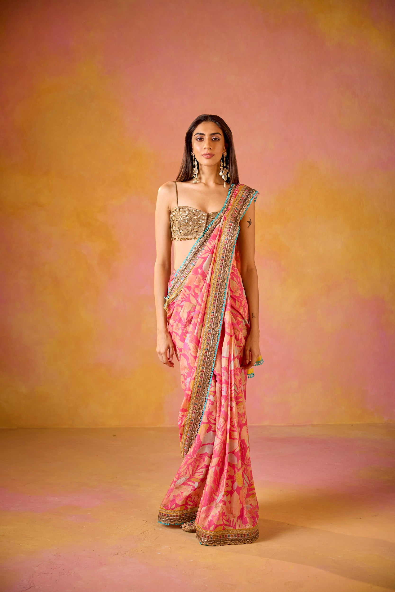 Aarohi Pink Muslin Saree With Gold Embroidered Blouse