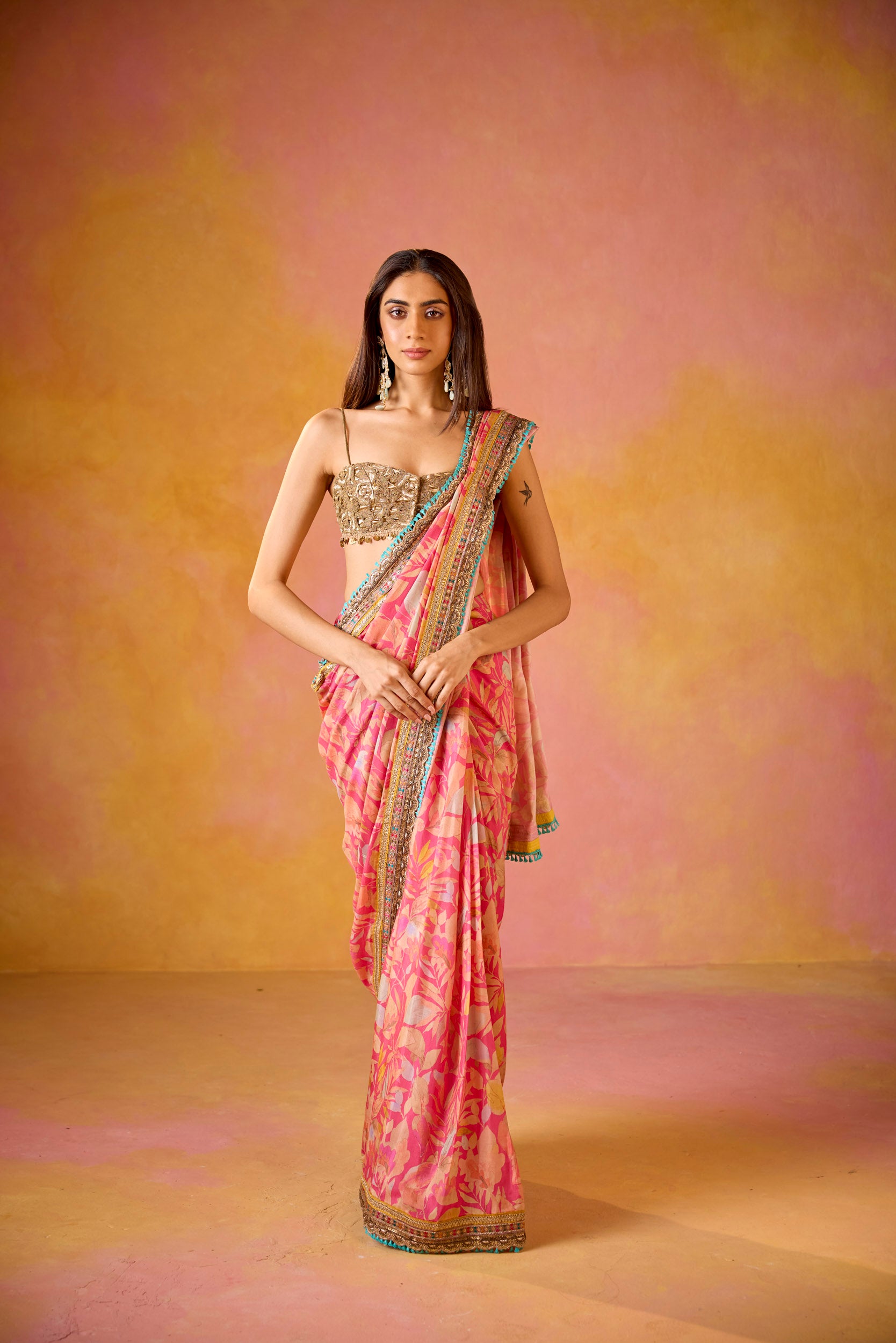 Aarohi Pink Muslin Saree With Gold Embroidered Blouse
