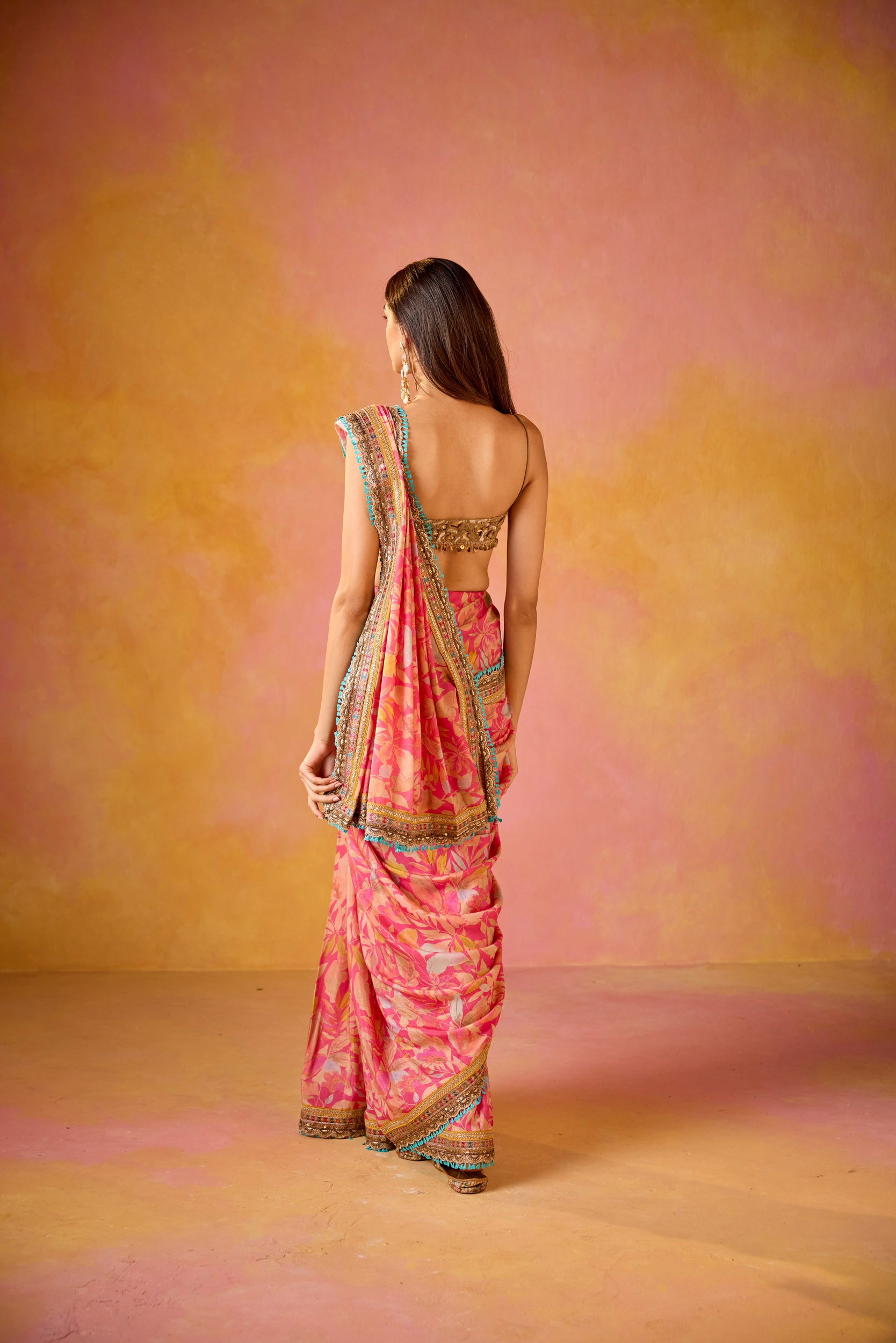Aarohi Pink Muslin Saree With Gold Embroidered Blouse