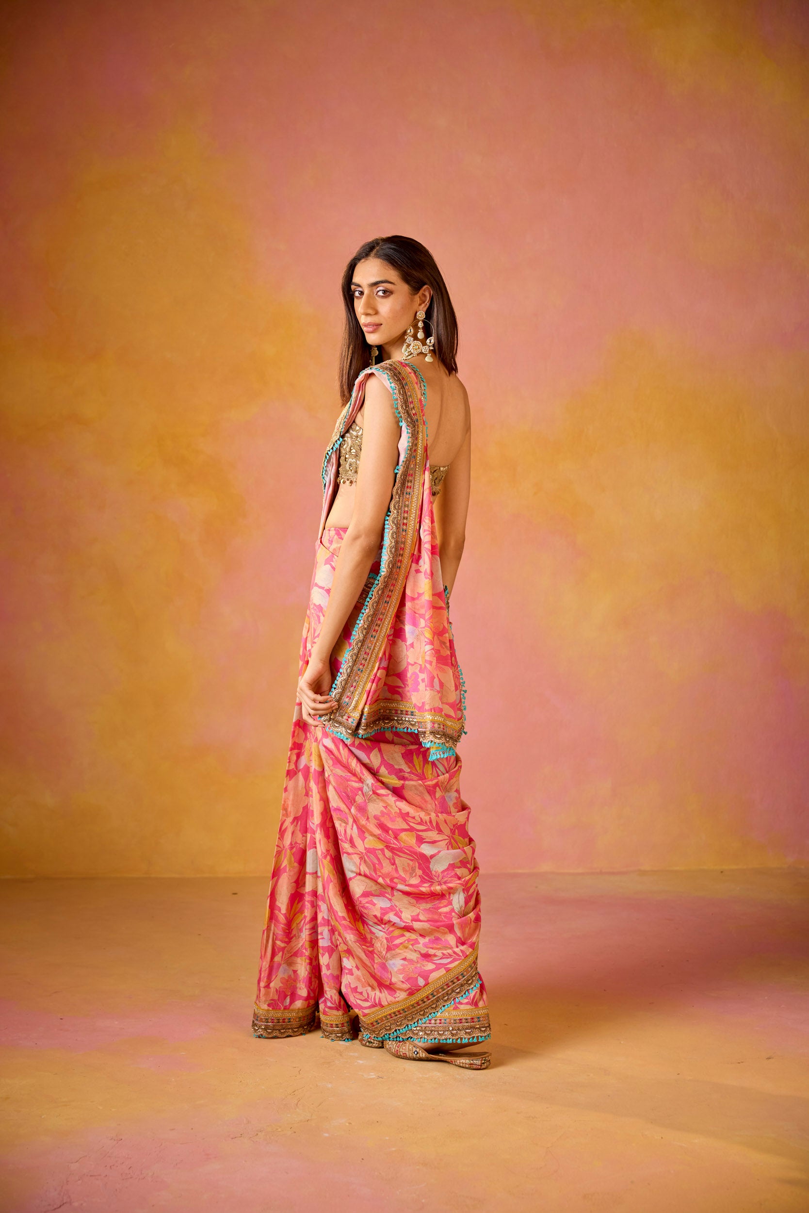 Aarohi Pink Muslin Saree With Gold Embroidered Blouse