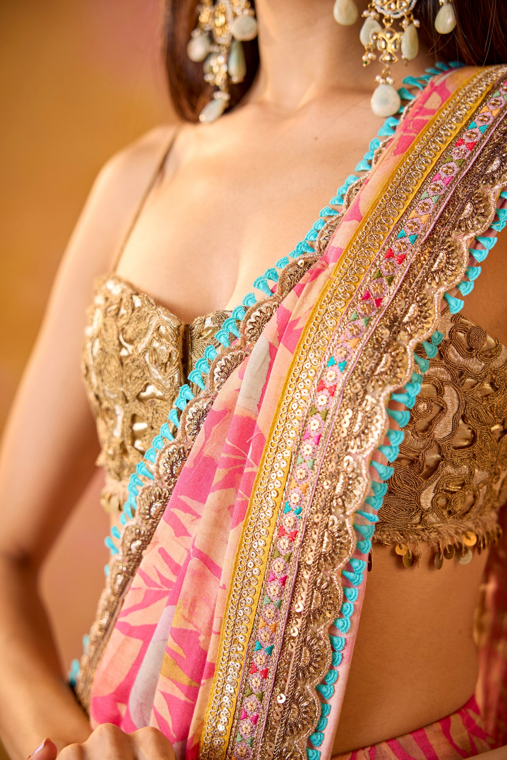 Aarohi Pink Muslin Saree With Gold Embroidered Blouse