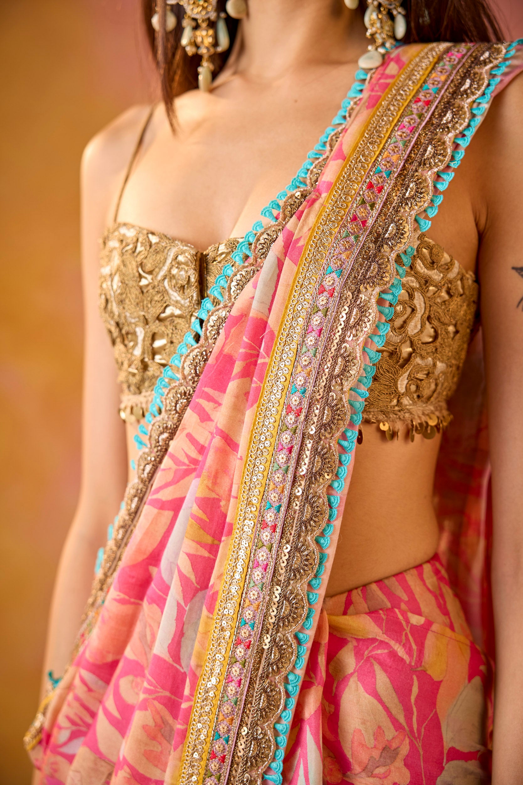 Aarohi Pink Muslin Saree With Gold Embroidered Blouse