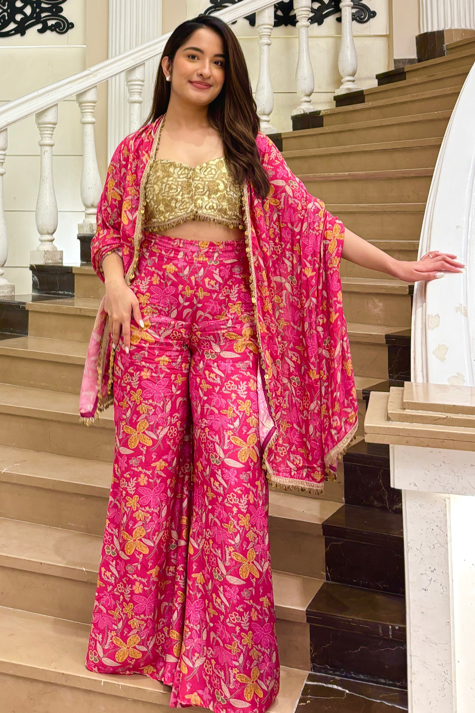 Mannat Hot Pink Muslin Sharara Set With Gold Embroidered Blouse