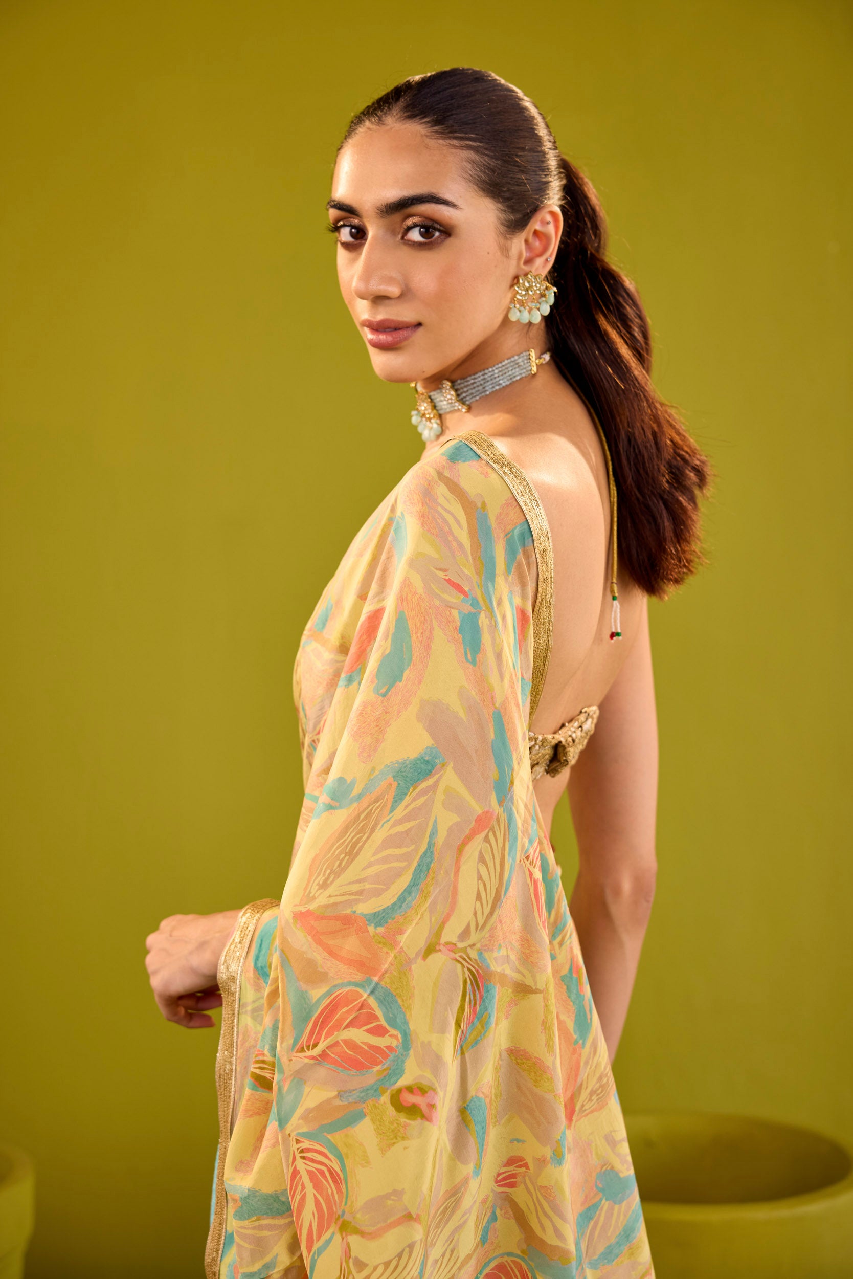 Kashish Yellow Crepe Saree With Gold Embroidered Strapless Blouse